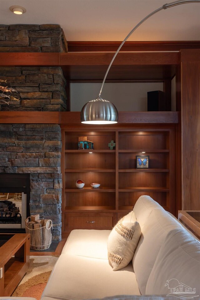 bedroom featuring a fireplace