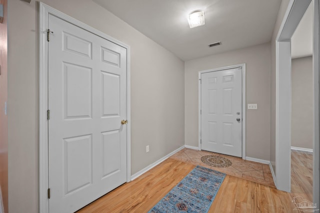 20033 Erin Pond, Seminole, AL 36574 - foyer featuring baseboards, light wood-style flooring, and visible vents