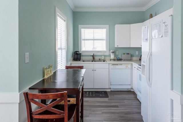 kitchen featuring white appliances, white cabinetry, dark hardwood / wood-style flooring, and sink