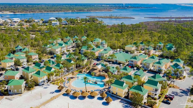 birds eye view of property featuring a water view