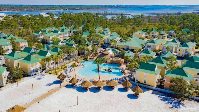 birds eye view of property featuring a water view