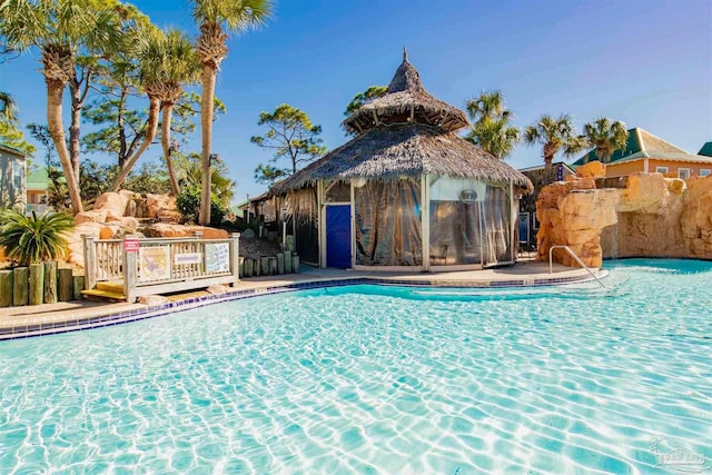 view of pool featuring a wooden deck