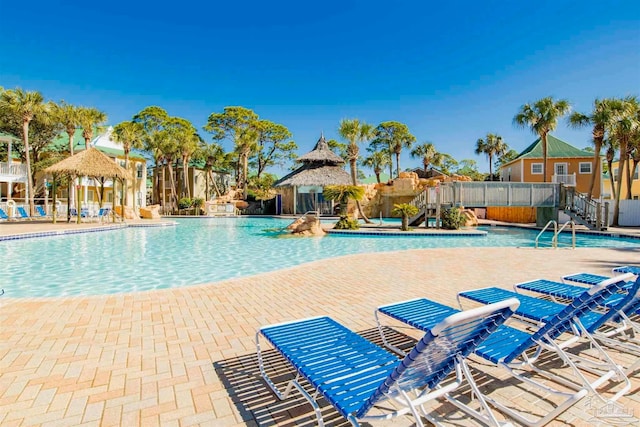 view of swimming pool with a gazebo and a patio