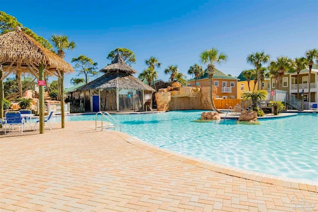 view of swimming pool featuring a gazebo and a patio area