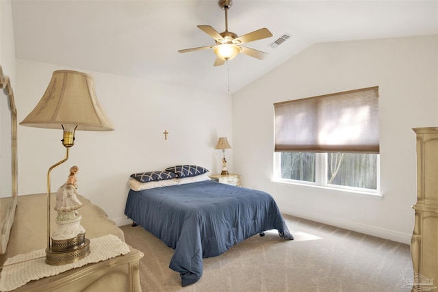 carpeted bedroom with lofted ceiling and ceiling fan