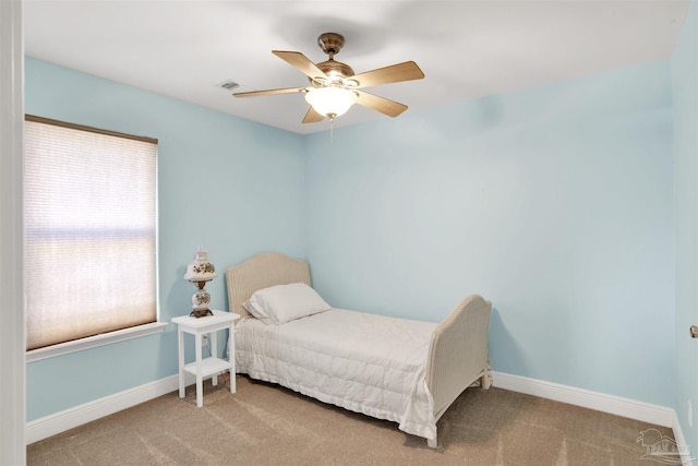 bedroom featuring ceiling fan and carpet flooring