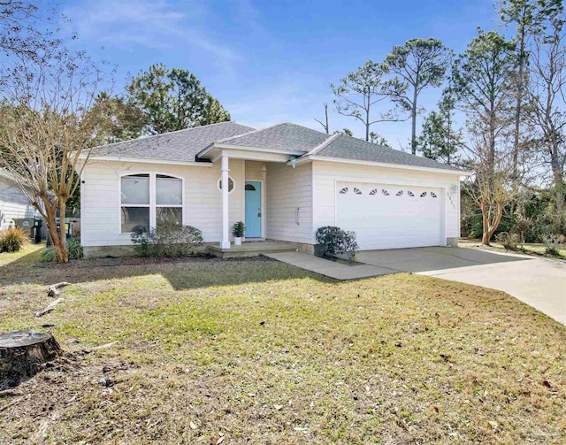 single story home featuring a garage and a front lawn