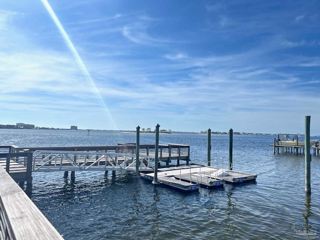 dock area featuring a water view