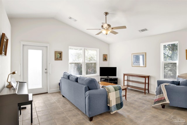 tiled living room with vaulted ceiling and ceiling fan