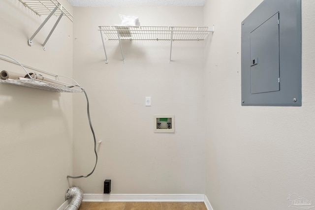 laundry area featuring hookup for a washing machine and electric panel