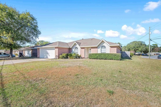 ranch-style house featuring a garage and a front lawn