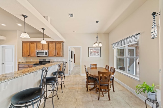 view of tiled dining space