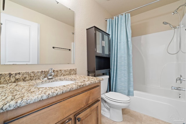 full bathroom with tile patterned floors, vanity, shower / bath combo, and toilet