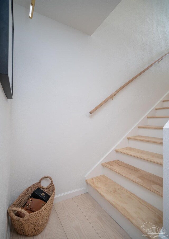 hall featuring hardwood / wood-style flooring