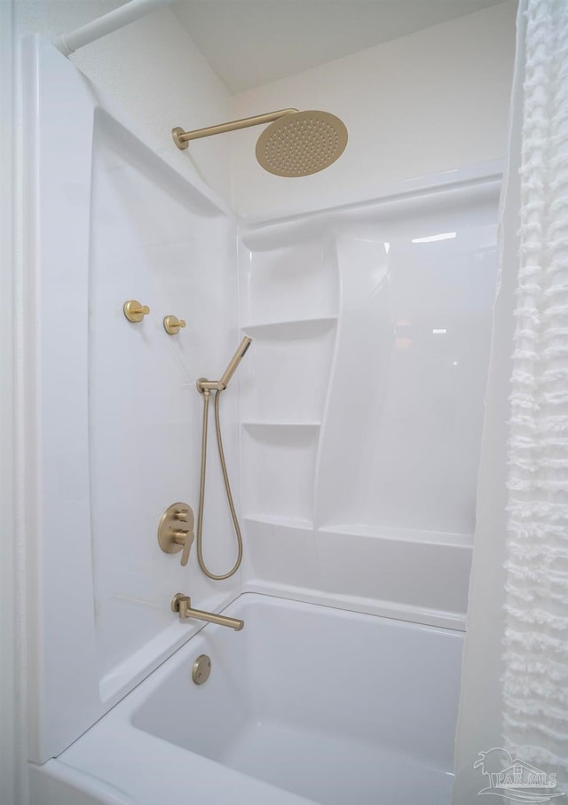 bathroom with shower / tub combo