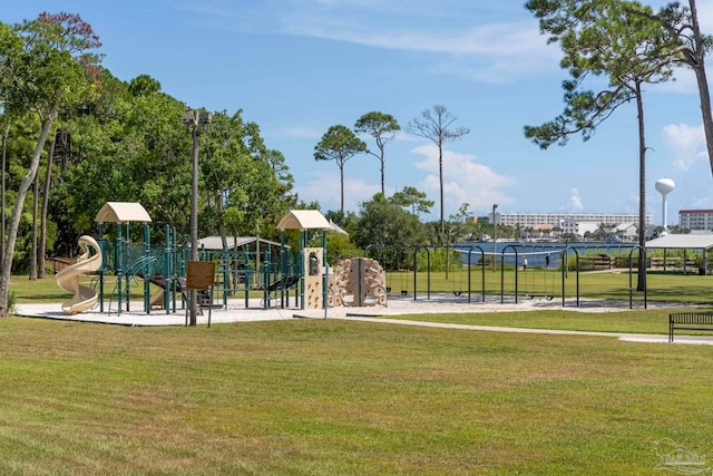 surrounding community with a lawn and a playground