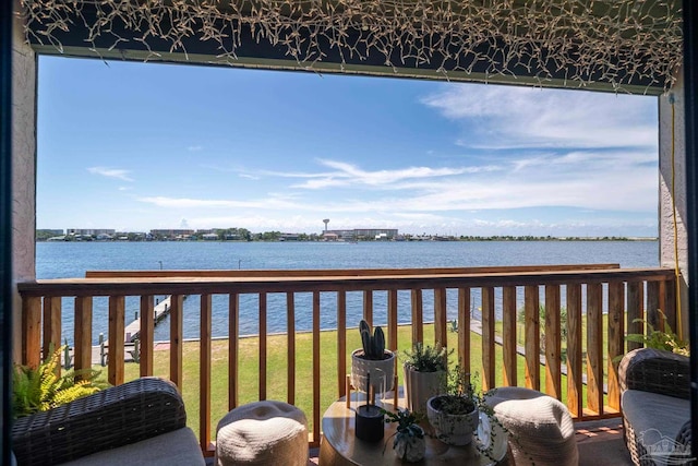 balcony featuring a water view