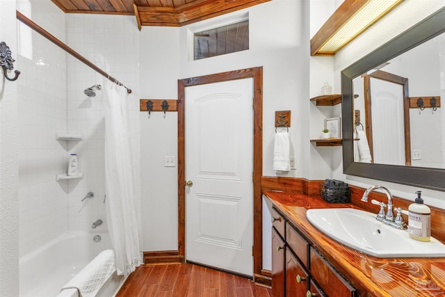 bathroom featuring shower / tub combo, vanity, and wood finished floors