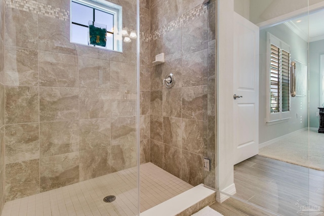 14273 Beach Heather Ct, Pensacola, FL 32507 - full bath featuring crown molding, wood finished floors, baseboards, and a shower stall
