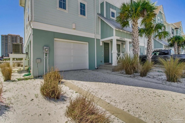14273 Beach Heather Ct, Pensacola, FL 32507 - view of front of home with an attached garage and driveway