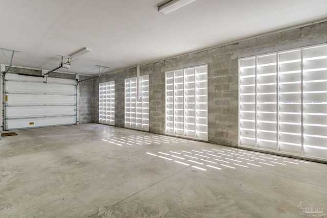 14273 Beach Heather Ct, Pensacola, FL 32507 - garage featuring a garage door opener
