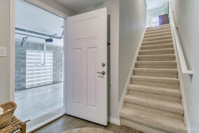 14273 Beach Heather Ct, Pensacola, FL 32507 - stairs featuring baseboards and wood finished floors
