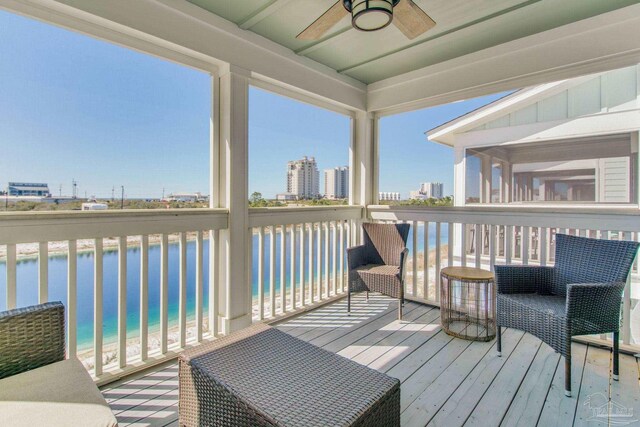 14273 Beach Heather Ct, Pensacola, FL 32507 - wooden terrace with a water view, a view of city, and a ceiling fan