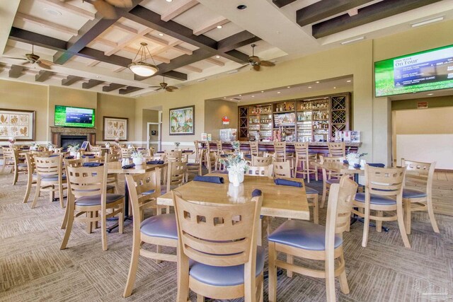 14273 Beach Heather Ct, Pensacola, FL 32507 - dining room featuring beam ceiling, a ceiling fan, coffered ceiling, recessed lighting, and carpet floors
