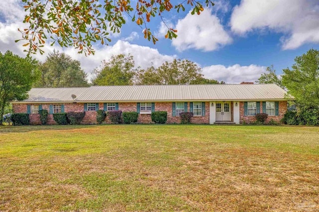 ranch-style house featuring a front yard