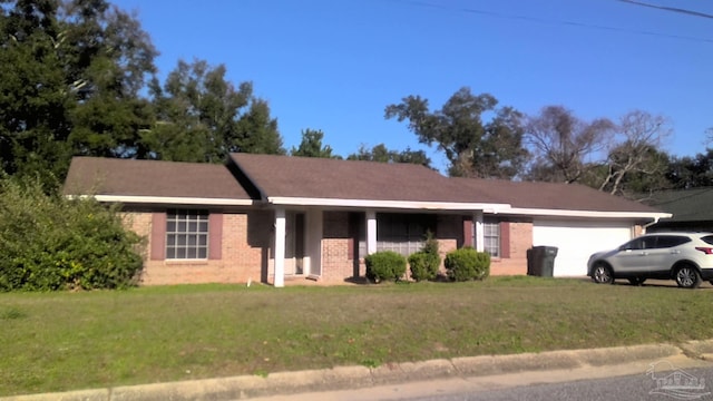 8194 Squire Rd, Pensacola, FL 32514 - single story home featuring an attached garage, a front yard, and brick siding