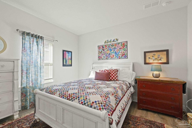 bedroom featuring light hardwood / wood-style flooring