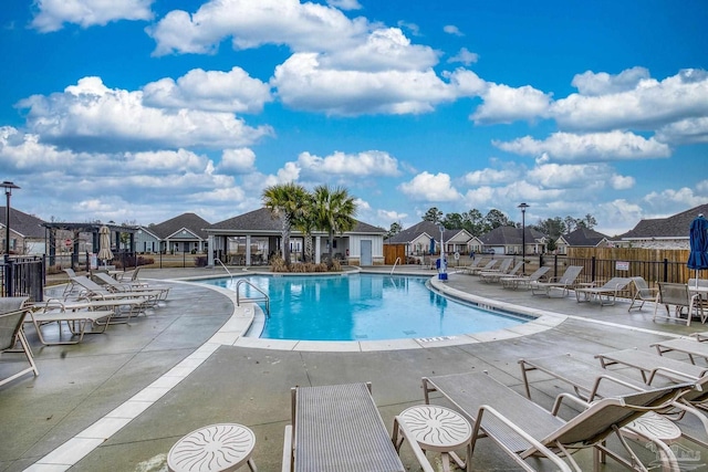 view of swimming pool featuring a patio area