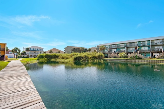 dock area with a water view