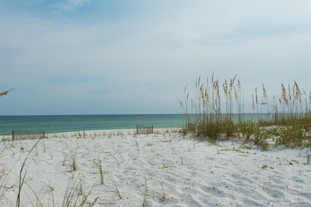 property view of water featuring a view of the beach