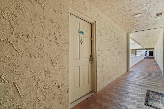 hallway with visible vents