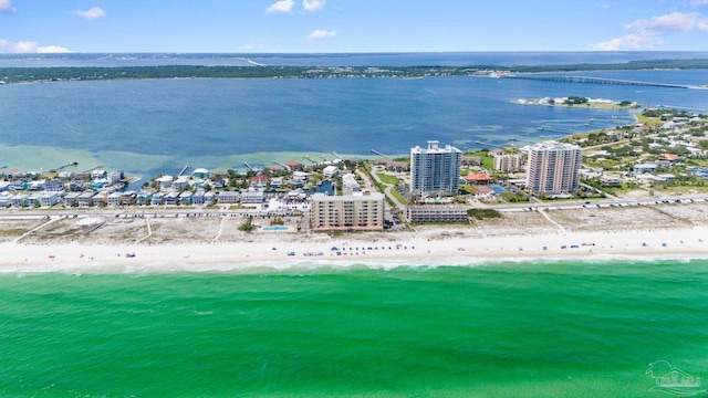 bird's eye view featuring a view of city, a beach view, and a water view