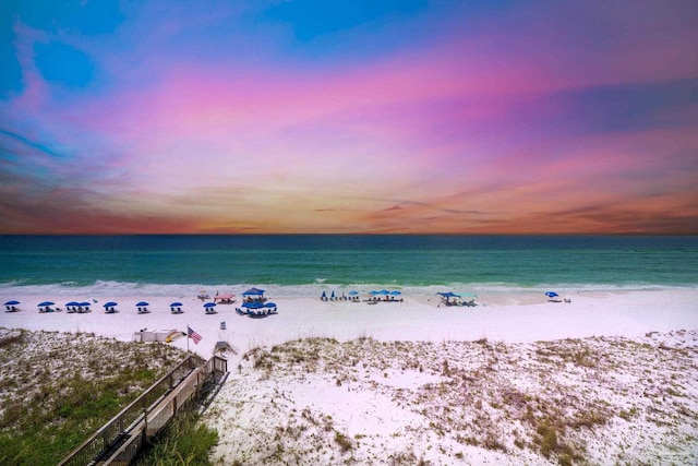property view of water featuring a beach view