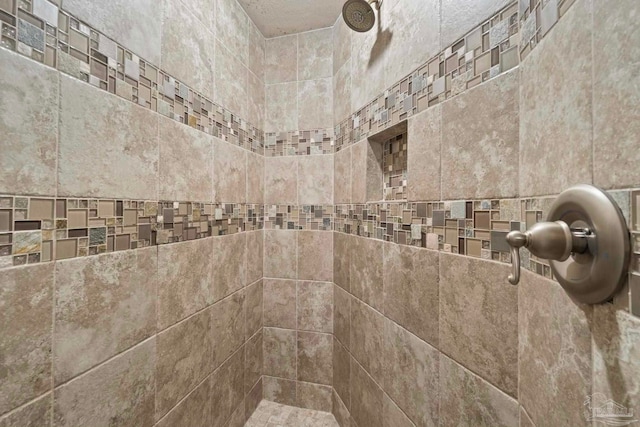 room details with a tile shower