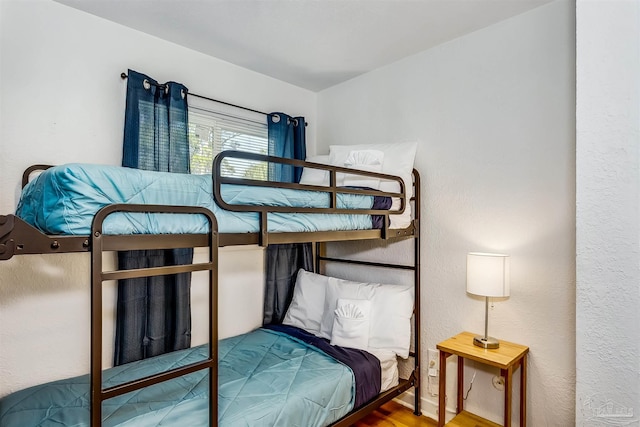 bedroom featuring hardwood / wood-style floors