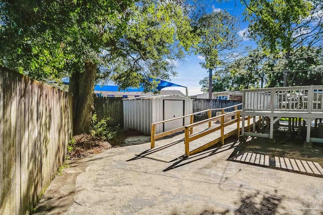 view of patio / terrace with a shed