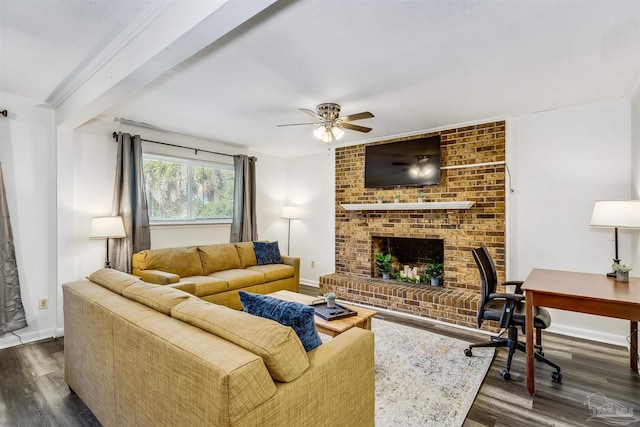 living room featuring ceiling fan, dark hardwood / wood-style flooring, and a fireplace