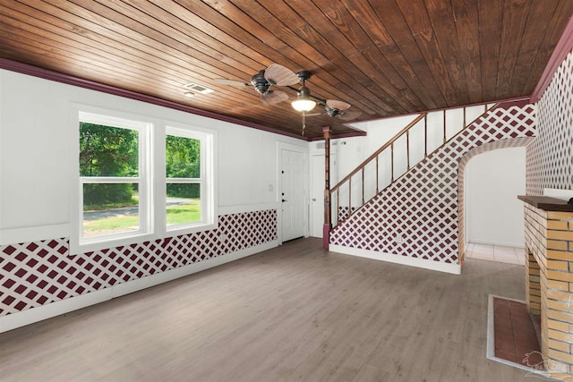4881 Calvin Dr, Milton, FL 32583 - entryway with stairway, wood finished floors, wood ceiling, and a ceiling fan