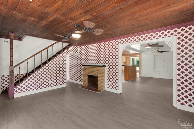 4881 Calvin Dr, Milton, FL 32583 - unfurnished living room featuring ceiling fan, wood finished floors, crown molding, wood ceiling, and baseboards