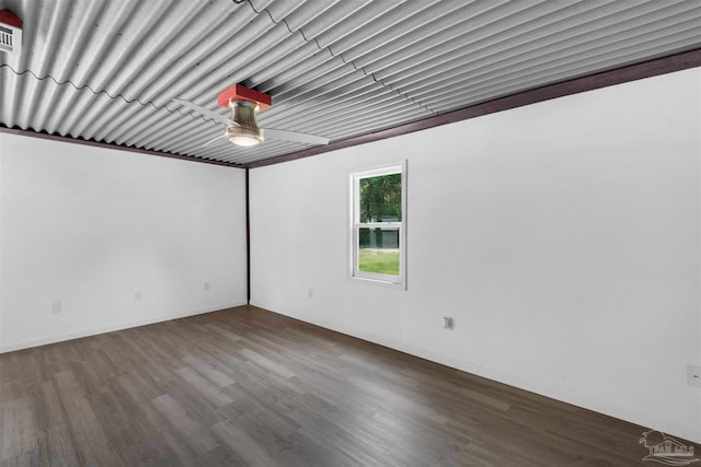4881 Calvin Dr, Milton, FL 32583 - empty room featuring wood finished floors, a ceiling fan, and baseboards