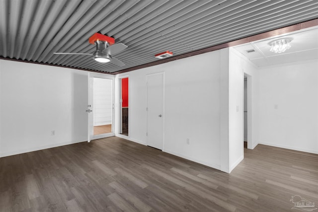 4881 Calvin Dr, Milton, FL 32583 - garage with ceiling fan and baseboards