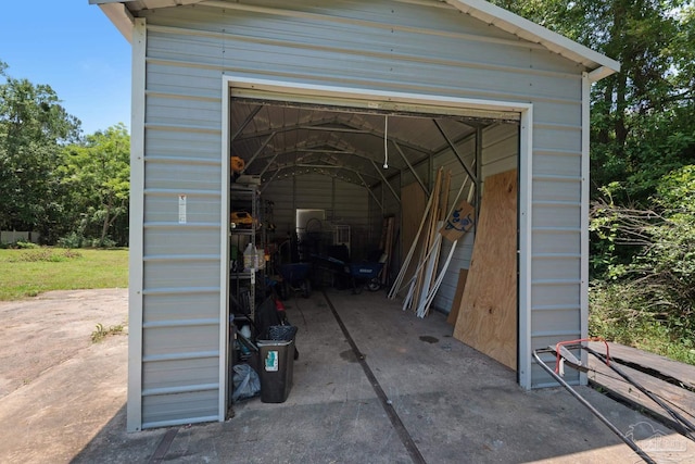 4881 Calvin Dr, Milton, FL 32583 - view of outbuilding featuring a garage