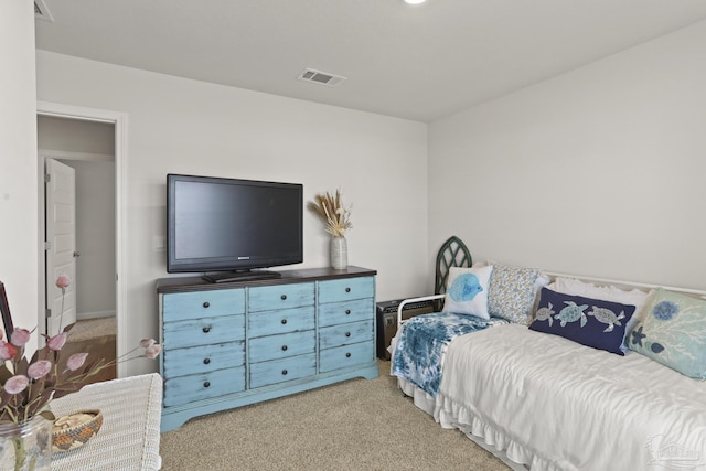 bedroom with carpet floors and visible vents