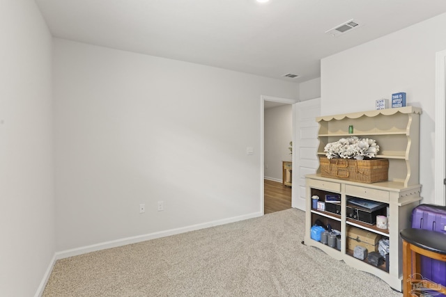 interior space featuring visible vents and baseboards