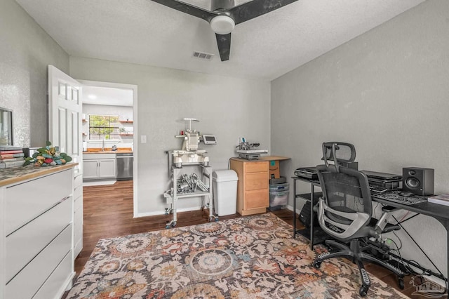 4684 Evelyn St, Pace, FL 32571 - office space with wood finished floors, ceiling fan, and a textured wall