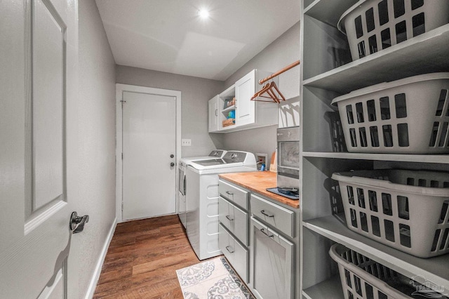 4684 Evelyn St, Pace, FL 32571 - laundry room featuring cabinet space, washer and clothes dryer, light wood-type flooring, and baseboards